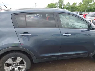 2013 Kia Sportage LX with VIN KNDPB3A26D7452008, listed as a IAAI auction lot 42435597 with 109,397 mi miles and . Bid and sale history available at DreamBid. Image 14.