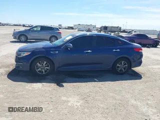 2016 Kia Optima LX Turbo with VIN 5XXGT4L13GG030586, listed as a IAAI auction lot 41824682 with 147,401 mi miles. Bid and sale history available at carsss.com. Image 14.