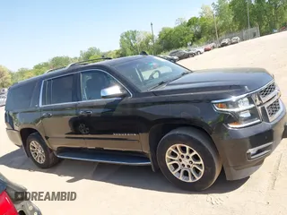2016 Chevrolet Suburban LTZ with VIN 1GNSKJKC5GR328723, listed as a IAAI auction lot 42253610 with 183,423 mi miles and . Bid and sale history available at DreamBid. Image 13.