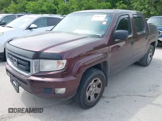 2009 Honda Ridgeline RT with VIN 5FPYK16239B109716, listed as a IAAI auction lot 42068772 with 206,649 mi miles. Bid and sale history available at carsss.com. Image 19.