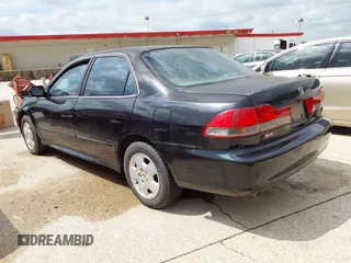2001 Honda Accord EX z VIN 1HGCG16571A046374, wystawiony jako IAAI lot #42210342 z przebiegiem 184 261 mil mil oraz . Historia ofert i sprzedaży dostępna na DreamBid. Obrazek 3.