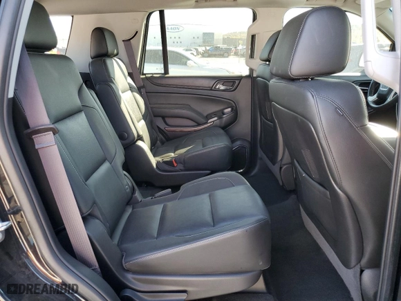 2016 GMC Yukon SLT with VIN 1GKS2BKC2GR251876, listed as a Copart auction lot 77204944 with 111,099 mi miles and Salvage Title. Bid and sale history available at carsss.com. Image 12.