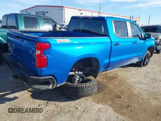 2023 Chevrolet Silverado 1500 LT Trail Boss with VIN 3GCUDFED9PG117005, listed as a IAAI auction lot 41505108 with 14,575 mi miles and . Bid and sale history available at DreamBid. Image 4.