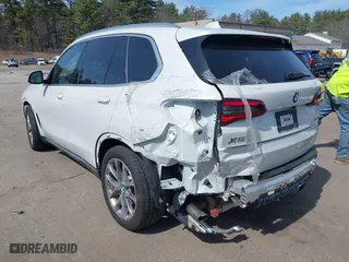 2023 BMW X5 xDrive40i with VIN 5UXCR6C01P9P16931, listed as a IAAI auction lot 41900689 with 12,174 mi miles. Bid and sale history available at carsss.com. Image 3.