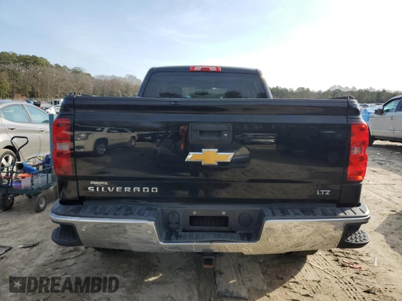 2014 Chevrolet Silverado 1500 LTZ with VIN 1GCVKSEC3EZ269921, listed as a Copart auction lot 84896084 with 136,671 mi miles and Salvage Title. Bid and sale history available at DreamBid. Image 6.