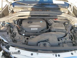 2018 BMW X1 sDrive28i with VIN WBXHU7C36J5H41267, listed as a IAAI auction lot 41270207 with 84,726 mi miles. Bid and sale history available at carsss.com. Image 10.