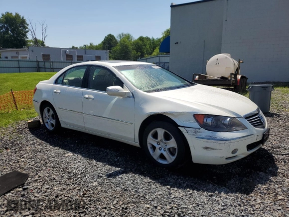 2006 Acura RL z VIN JH4KB16576C012132, wystawiony jako Copart lot #61897805 z przebiegiem 143 101 mil mil oraz Szkoda całkowita • Salvage title. Historia ofert i sprzedaży dostępna na DreamBid. Obrazek 4.
