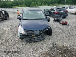 2009 Nissan Versa S with VIN 3N1BC11E19L433572, listed as a Copart auction lot 54084215 with 144,178 mi miles and Salvage title. Bid and sale history available at DreamBid. Image 14.