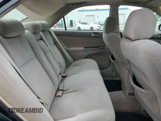 2006 Toyota Camry LE z VIN 4T1BF32K56U621741, wystawiony jako Copart lot #59577595 z przebiegiem 189 155 mil mil oraz Czysty tytuł • Clean title. Historia ofert i sprzedaży dostępna na DreamBid. Obrazek 10.