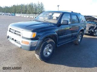1997 Toyota 4Runner Limited with VIN JT3HN87R1V0079567, listed as a IAAI auction lot 41725597 with 291,662 mi miles. Bid and sale history available at carsss.com. Image 2.