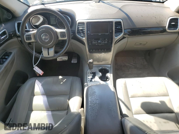 2012 Jeep Grand Cherokee Laredo with VIN 1C4RJFAT8CC307774, listed as a Copart auction lot 48368725 with 84,549 mi miles and Salvage Title. Bid and sale history available at carsss.com. Image 8.