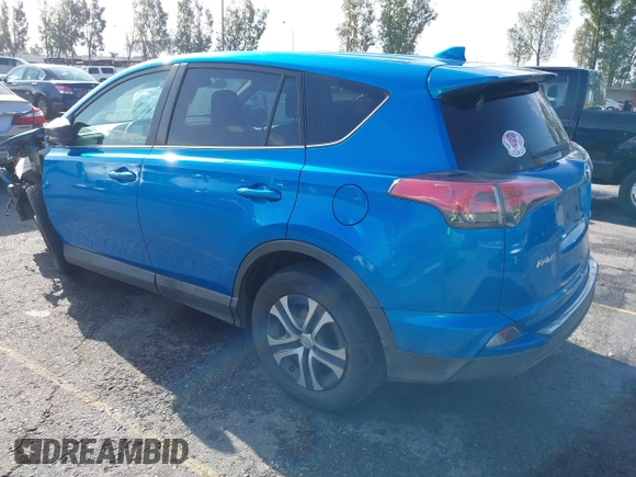 2018 Toyota RAV4 LE with VIN 2T3ZFREV9JW442691, listed as a IAAI auction lot 41946423 with 133,856 mi miles. Bid and sale history available at carsss.com. Image 3.