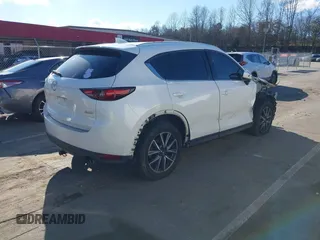 2018 Mazda CX-5 Grand Touring with VIN JM3KFBDM6J0435579, listed as a IAAI auction lot 41208899 with 131,212 mi miles. Bid and sale history available at carsss.com. Image 4.