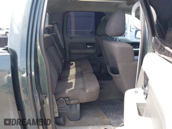 2004 Ford F-150 XLT z VIN 1FTRW12W44KC01682, wystawiony jako IAAI lot #42649058 z przebiegiem Nie podano mil oraz . Historia ofert i sprzedaży dostępna na DreamBid. Obrazek 8.