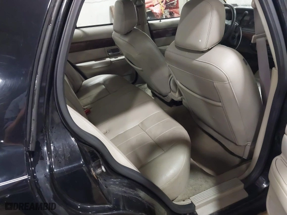 2009 Mercury Grand Marquis LS with VIN 2MEHM75V39X602084, listed as a IAAI auction lot 41615859 with 102,051 mi miles. Bid and sale history available at carsss.com. Image 8.