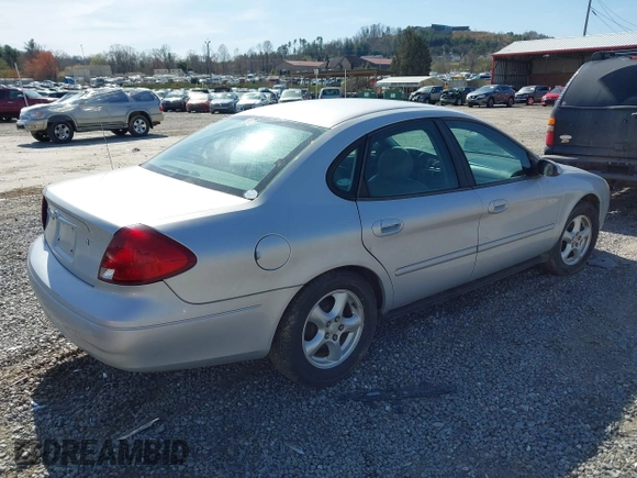 2003 Ford Taurus SES Standard with VIN 1FAFP55U73G245779, listed as a IAAI auction lot 41935697 with 145,414 mi miles. Bid and sale history available at carsss.com. Image 4.