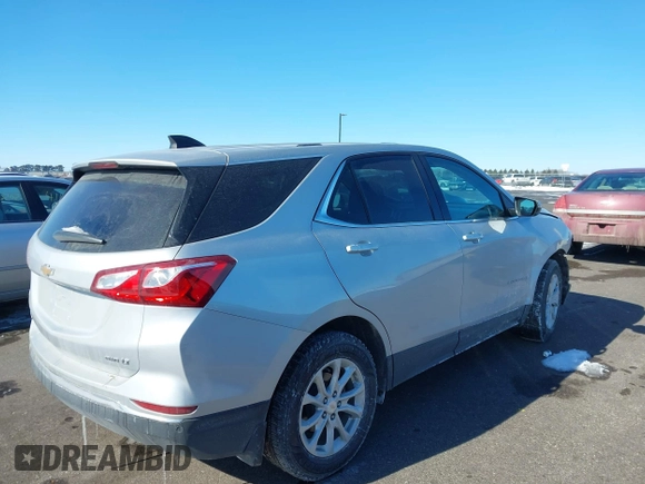 2018 Chevrolet Equinox LT z VIN 2GNAXSEV9J6350260, wystawiony jako IAAI lot #41625613 z przebiegiem 75 317 mil mil oraz . Historia ofert i sprzedaży dostępna na DreamBid. Obrazek 4.