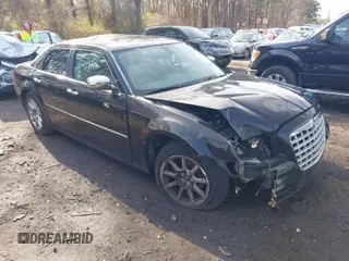 2009 Chrysler 300 Limited with VIN 2C3KA33V59H570460, listed as a IAAI auction lot 42017573 with 130,600 mi miles. Bid and sale history available at carsss.com. Image 1.