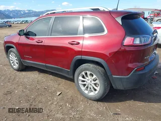 2019 Jeep Cherokee Latitude with VIN 1C4PJMCB2KD473832, listed as a IAAI auction lot 41555931 with 104,990 mi miles and . Bid and sale history available at DreamBid. Image 3.