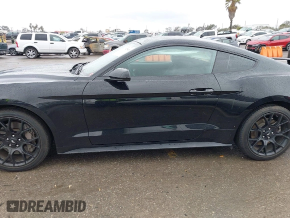 2018 Ford Mustang EcoBoost z VIN 1FA6P8TH3J5129088, wystawiony jako IAAI lot #41792548 z przebiegiem 55 991 mil mil oraz . Historia ofert i sprzedaży dostępna na DreamBid. Obrazek 14.