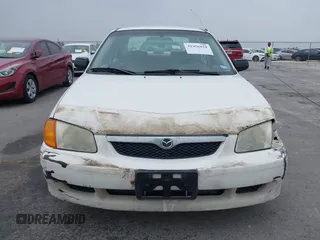 2000 Mazda Protege DX with VIN JM1BJ2220Y0273953, listed as a IAAI auction lot 41956058 with 158,837 mi miles and . Bid and sale history available at DreamBid. Image 12.