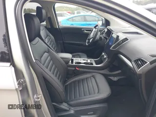 2024 Ford Edge SEL z VIN 2FMPK4J94RBA67639, wystawiony jako IAAI lot #40316176 z przebiegiem 5319 mil mil oraz . Historia ofert i sprzedaży dostępna na DreamBid. Obrazek 5.