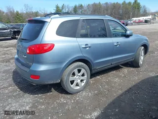 2009 Hyundai Santa Fe SE with VIN 5NMSH13E69H332648, listed as a IAAI auction lot 41948343 with 164,653 mi miles. Bid and sale history available at carsss.com. Image 4.
