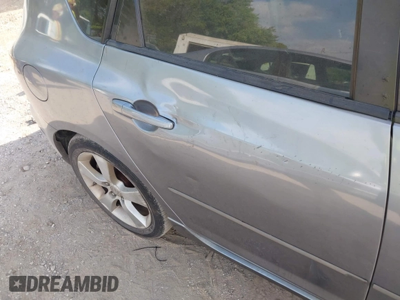 2004 Mazda 3 s with VIN JM1BK343841189022, listed as a IAAI auction lot 42228628 with 209,725 mi miles and . Bid and sale history available at DreamBid. Image 12.