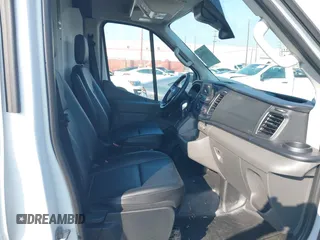 2023 Ford Transit Cargo with VIN 1FTBR1C85PKC08945, listed as a IAAI auction lot 41385685 with 5,577 mi miles and . Bid and sale history available at DreamBid. Image 5.