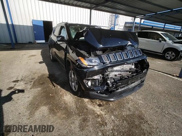 2019 Jeep Compass Latitude with VIN 3C4NJCBB1KT750032, listed as a Copart auction lot 82931994 with 59,293 mi miles and Salvage Title. Bid and sale history available at DreamBid. Image 11.