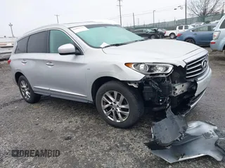 2015 Infiniti QX60 with VIN 5N1AL0MM4FC554511, listed as a IAAI auction lot 41065737 with 205,077 mi miles and . Bid and sale history available at DreamBid. Image 1.