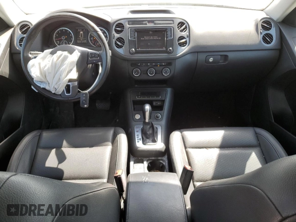 2017 Volkswagen Tiguan S with VIN WVGBV7AX8HK028302, listed as a Copart auction lot 52617685 with 108,191 mi miles and Salvage Title. Bid and sale history available at DreamBid. Image 8.