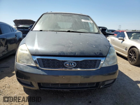 2012 Kia Sedona LX with VIN KNDMG4C71C6461660, listed as a Copart auction lot 70904534 with 163,548 mi miles and Clean Title. Bid and sale history available at carsss.com. Image 5.
