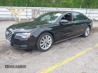 2013 Audi A8 3.0L с VIN WAURGAFD8DN012938, выставлен на аукционе IAAI как лот 42334901 с пробегом 64 235 миль миль и . История ставок и продаж доступна на DreamBid. Изображение 17.