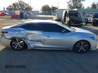 2021 Nissan Maxima SV with VIN 1N4AA6CV7MC512294, listed as a IAAI auction lot 42243607 with 87,803 mi miles and . Bid and sale history available at DreamBid. Image 13.