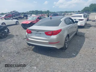 2014 Kia Optima SXL Turbo with VIN 5XXGR4A68EG286085, listed as a IAAI auction lot 42634481 with 160,217 mi miles and . Bid and sale history available at DreamBid. Image 4.