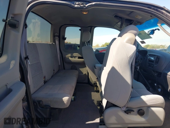 2003 Ford F-150 XL with VIN 1FTRX18WX3NA22323, listed as a IAAI auction lot 41635869 with 129,029 mi miles. Bid and sale history available at carsss.com. Image 8.