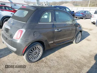 2012 FIAT 500 Lounge z VIN 3C3CFFER6CT109290, wystawiony jako IAAI lot #41958577 z przebiegiem 101 803 mil mil oraz . Historia ofert i sprzedaży dostępna na DreamBid. Obrazek 4.