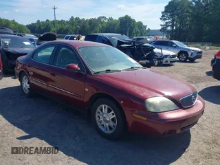 2005 Mercury Sable LS z VIN 1MEFM55S75A615070, wystawiony jako IAAI lot #42518613 z przebiegiem 161 661 mil mil oraz . Historia ofert i sprzedaży dostępna na DreamBid. Obrazek 1.
