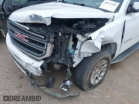 2019 GMC Yukon XL SLT with VIN 1GKS2GKC7KR165419, listed as a IAAI auction lot 40977930 with 167,195 mi miles and . Bid and sale history available at carsss.com. Image 6.