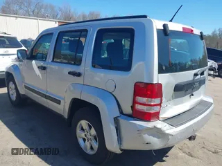 2011 Jeep Liberty Sport with VIN 1J4PN2GK9BW575064, listed as a IAAI auction lot 42062056 with 152,693 mi miles. Bid and sale history available at carsss.com. Image 3.