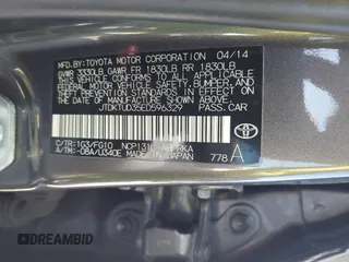 2014 Toyota Yaris L with VIN JTDKTUD35ED596329, listed as a IAAI auction lot 41705004 with 191,557 mi miles. Bid and sale history available at carsss.com. Image 9.