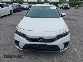 2024 Honda Civic EX z VIN 2HGFE1F77RH337748, wystawiony jako IAAI lot #42047010 z przebiegiem 5 598 mil mil oraz . Historia ofert i sprzedaży dostępna na DreamBid. Obrazek 12.