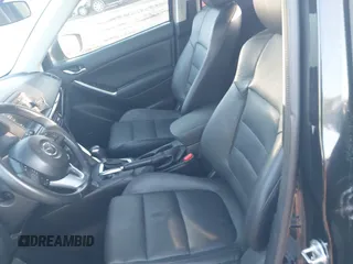 2015 Mazda CX-5 Grand Touring with VIN JM3KE4DY6F0513173, listed as a IAAI auction lot 41867030 with 93,770 mi miles. Bid and sale history available at carsss.com. Image 5.