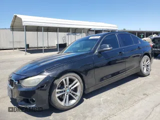 2013 BMW 3 Series 328i with VIN WBA3C1C58DF443773, listed as a Copart auction lot 61685705 with 181,933 mi miles and Salvage title. Bid and sale history available at DreamBid. Image 1.
