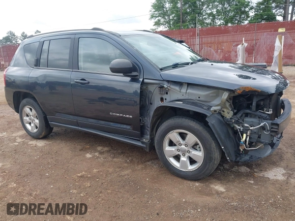 2014 Jeep Compass Sport with VIN 1C4NJCBA1ED725875, listed as a IAAI auction lot 42118863 with 133,136 mi miles. Bid and sale history available at carsss.com. Image 1.