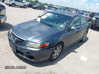 2005 Acura TSX with VIN JH4CL96805C035339, listed as a IAAI auction lot 42587430 with 212,221 mi miles and . Bid and sale history available at DreamBid. Image 2.