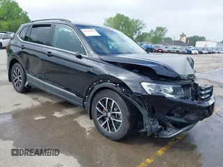 2021 Volkswagen Tiguan SE z VIN 3VV2B7AX9MM045580, wystawiony jako IAAI lot #42116249 z przebiegiem 59 608 mil mil oraz . Historia ofert i sprzedaży dostępna na DreamBid. Obrazek 1.