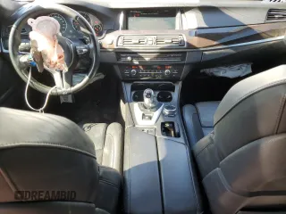 2014 BMW M5 with VIN WBSFV9C57ED097570, listed as a Copart auction lot 88571785 with 100,391 mi miles and Salvage Title. Bid and sale history available at carsss.com. Image 8.