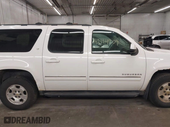2013 Chevrolet Suburban LT with VIN 1GNSKJE74DR145680, listed as a IAAI auction lot 42114209 with 178,052 mi miles and . Bid and sale history available at DreamBid. Image 14.